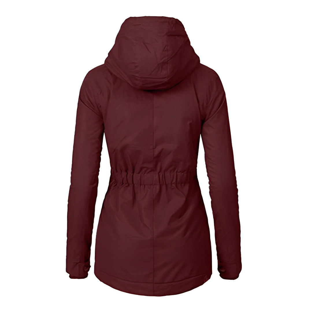 Agasalho feminino de inverno com capuz, impermeável e estiloso, perfeito para enfrentar o frio e a chuva.