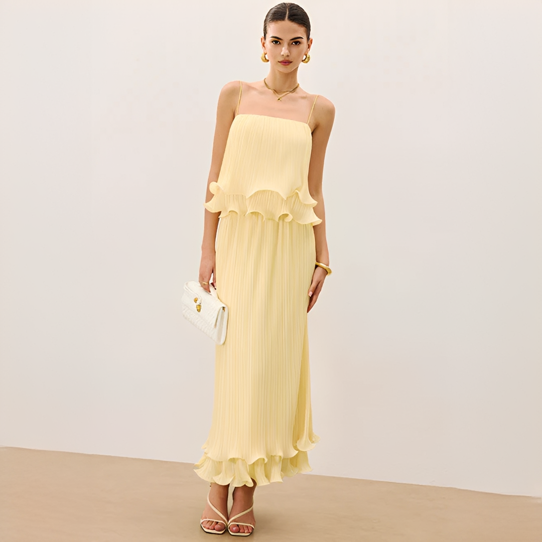 Conjunto feminino elegante de saia plissada para verão com top. Perfeito para moda casual chic.
