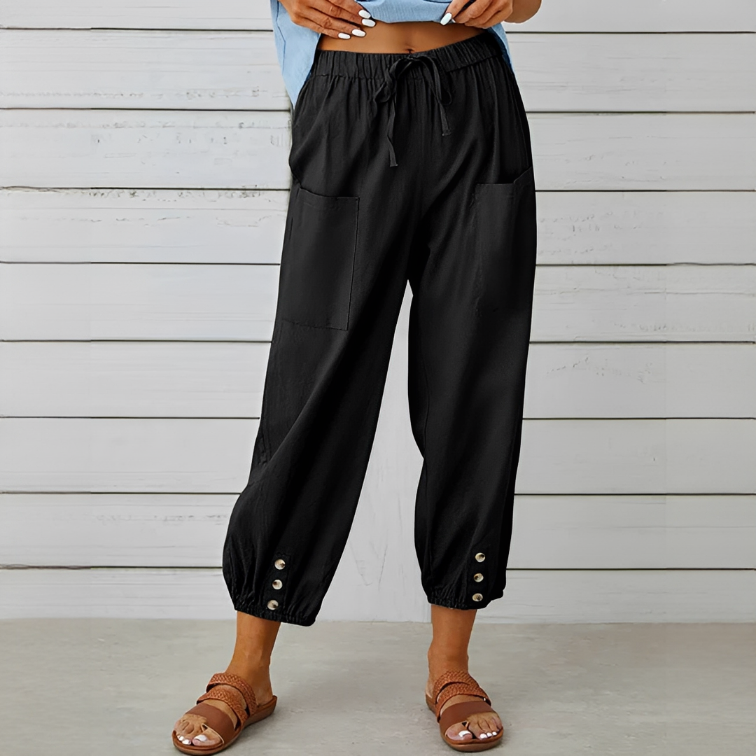 Calça feminina perna larga elegante, cintura alta. Roupa de verão versátil e confortável.