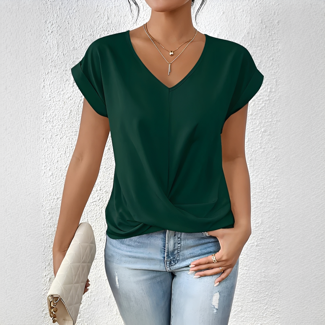 Moda feminina: blusa casual com decote V e nó, estilo e conforto para o verão.