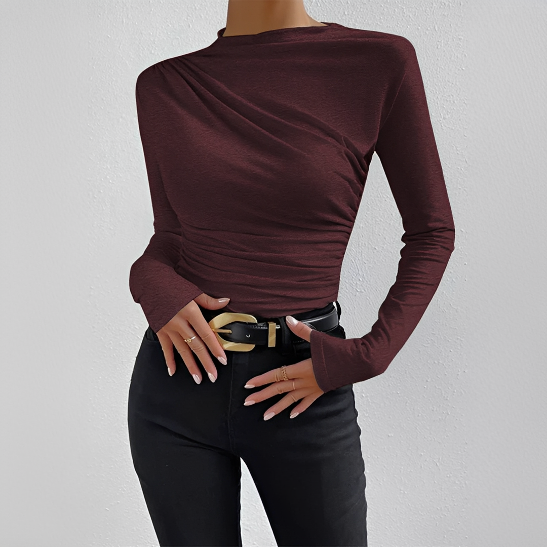Blusa feminina de manga longa para looks casuais e sociais, com design elegante e versátil.