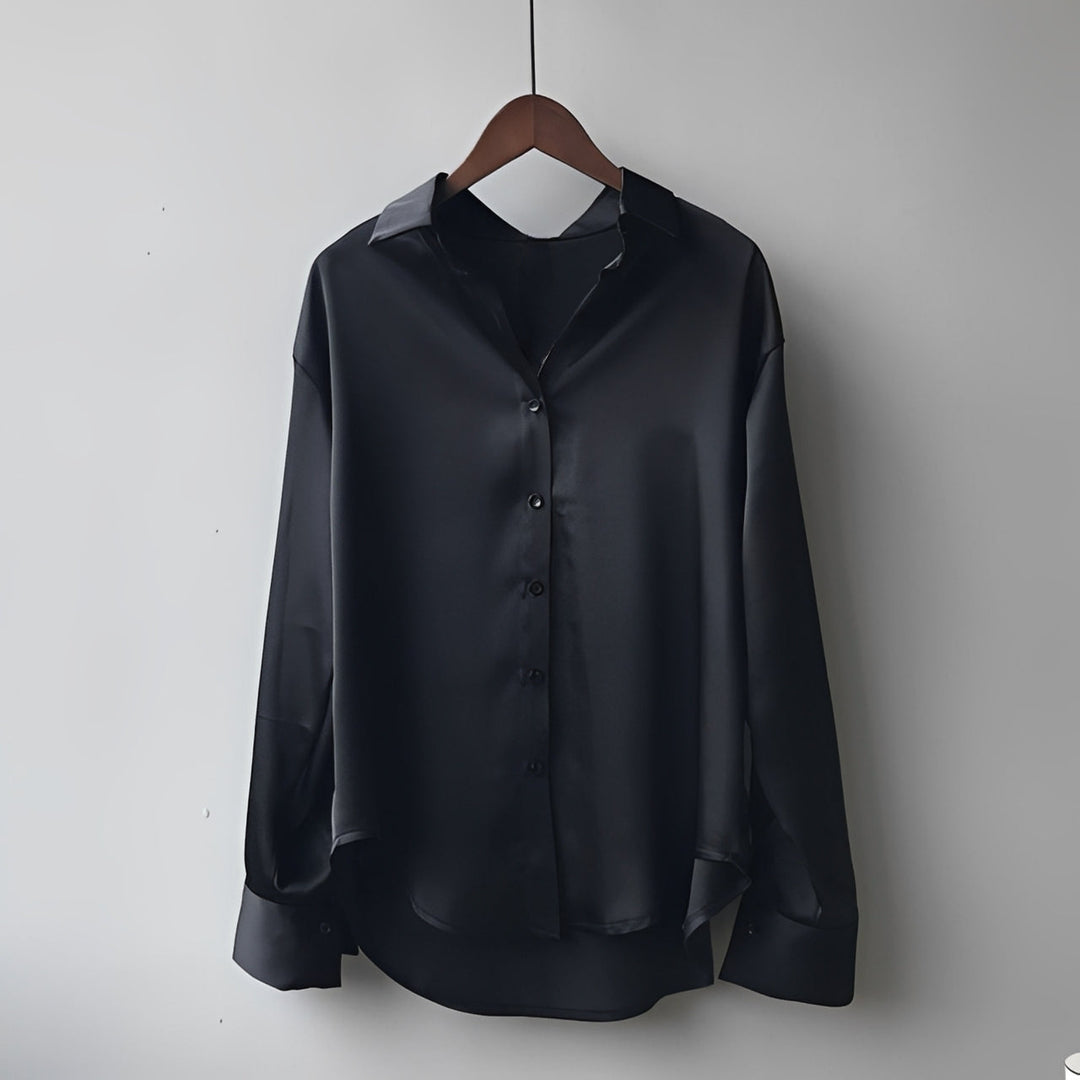 Camisa feminina elegante de manga longa, ideal para a moda mulher. Peça versátil que combina estilo e conforto.