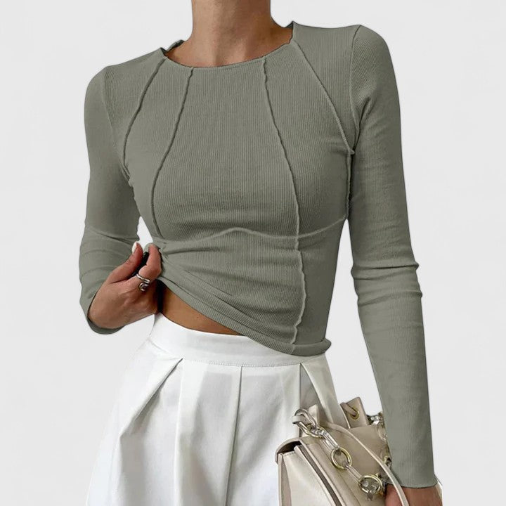 Blusa feminina confortável e versátil de manga comprida. Top casual e elegante, com decote redondo, para outono.