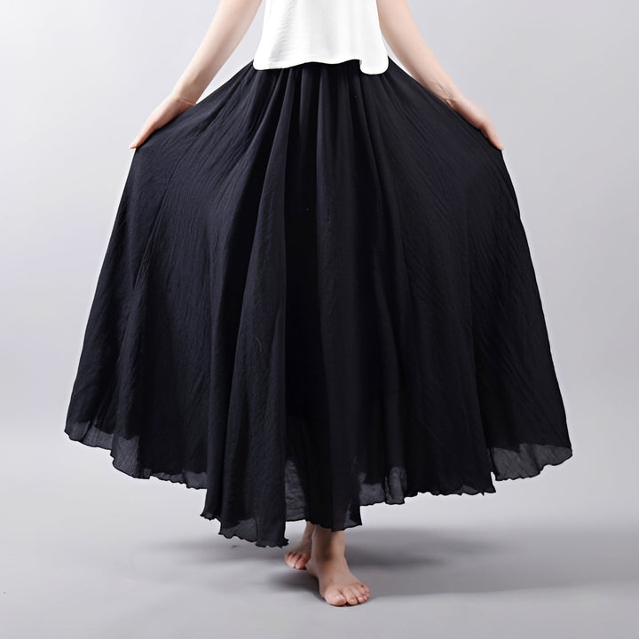 Saia maxi boêmia fluida feminina de verão. Cores vibrantes, leveza e estilo para moda casual e praia.