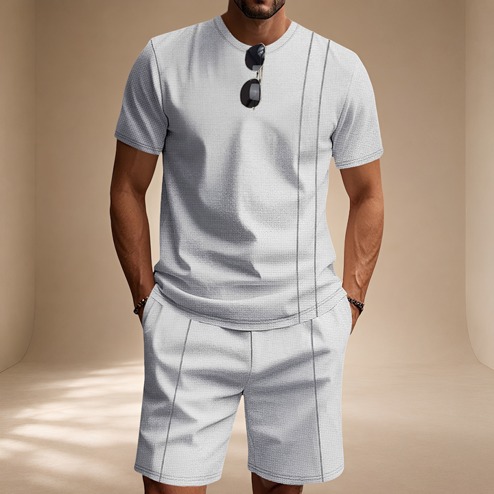 Conjunto masculino elegante para o verão. Moda casual 2 peças com shorts e camiseta para estilo e conforto.