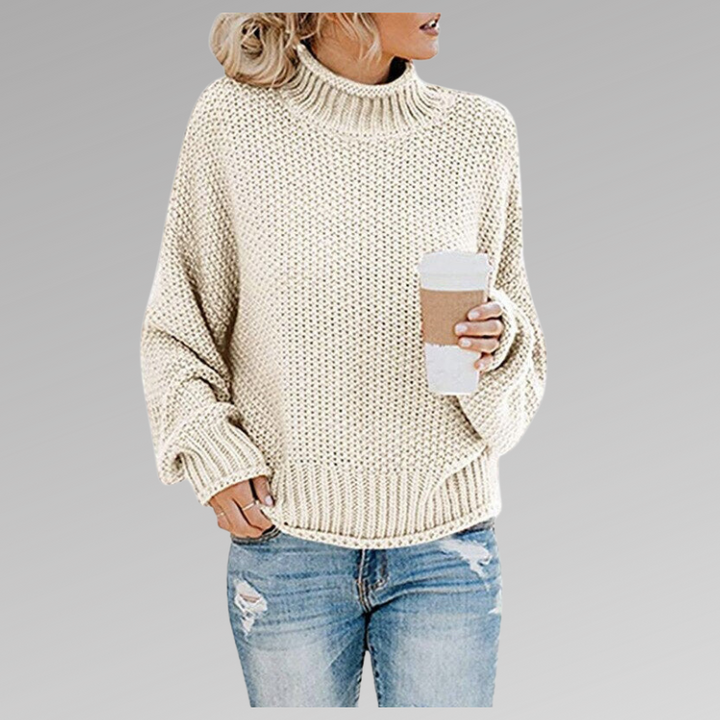 Suéter feminino clássico de malha, ideal para conforto e estilo diário no outono/inverno.