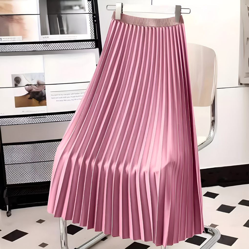 Saia feminina plissada midi cintura alta, com caimento fluido e chique, um item essencial na moda.