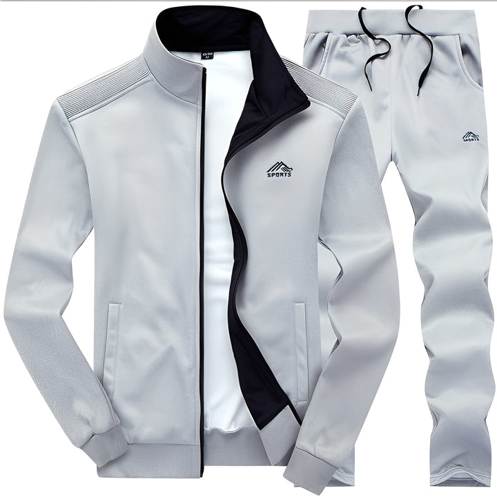 Conjunto esportivo masculino elegante com moletom e calça, ideal para conforto e estilo casual na primavera/outono.