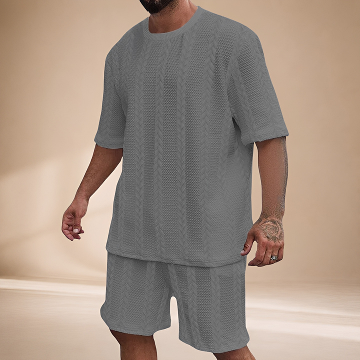 Conjunto de verão masculino ultra confortável, com shorts e camiseta soltos, perfeito para dias quentes e lazer.