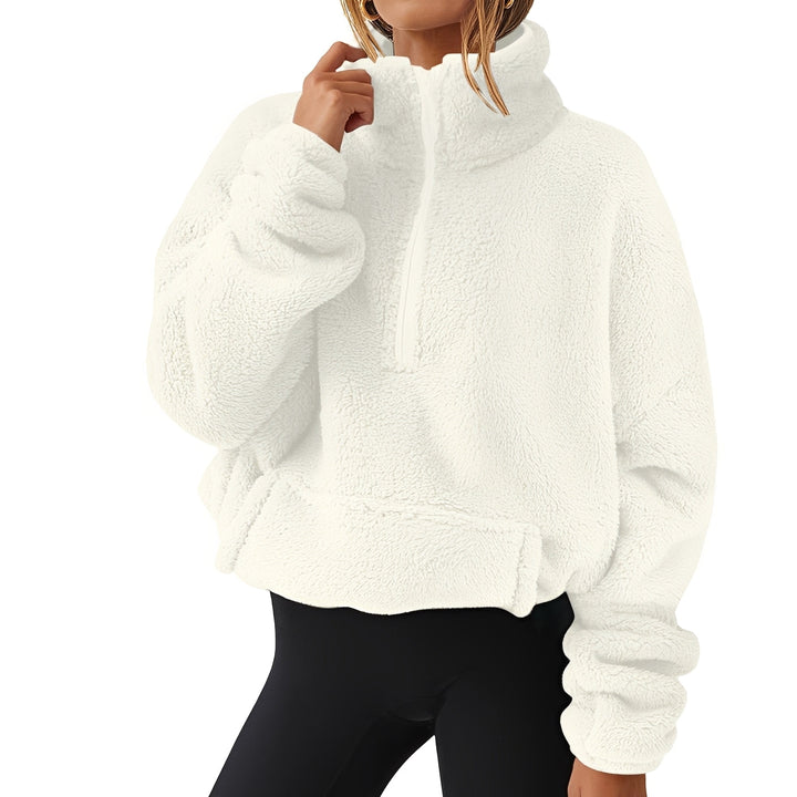 Roupa quente de inverno: suéter feminino com meio fecho, garantindo conforto e estilo para o frio.