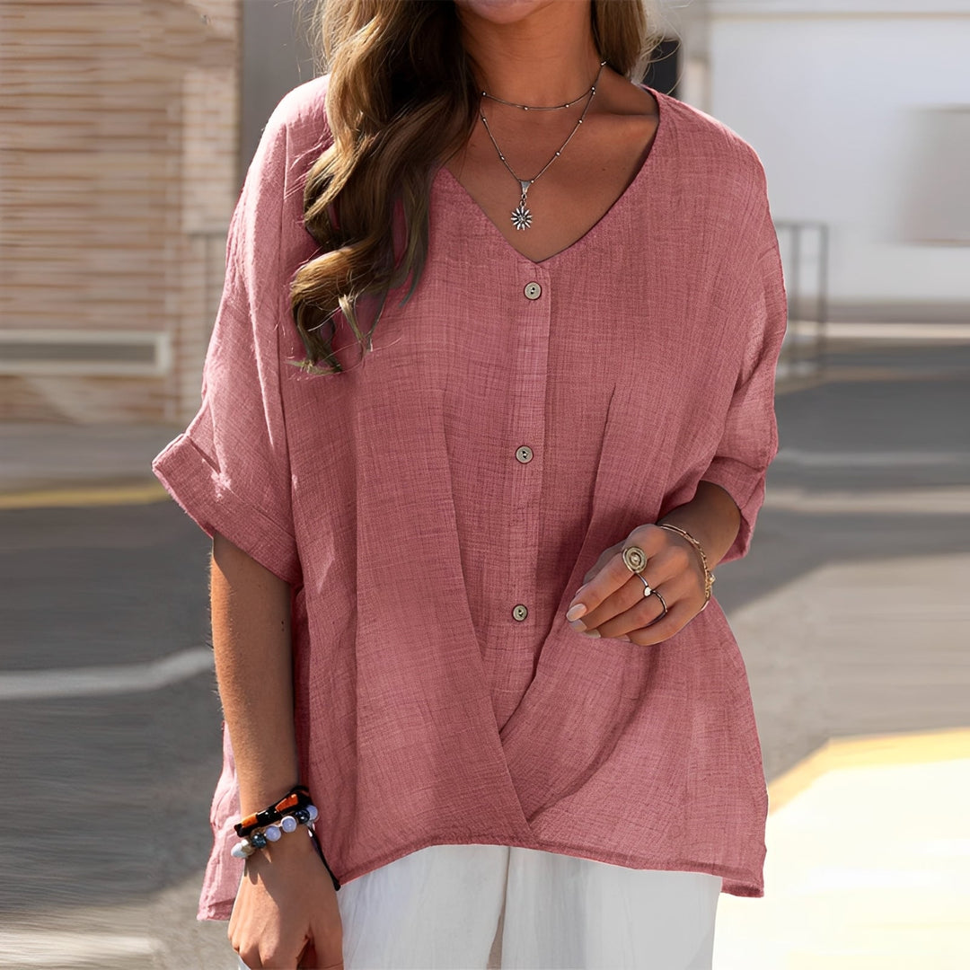 Blusa feminina casual solta para verão, tecido leve e arejado, ideal para conforto diário.