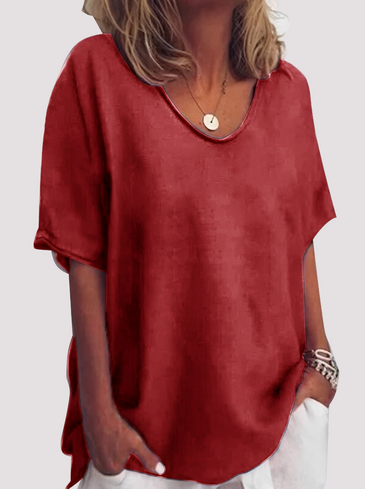 Blusa feminina de verão, solta e confortável. Perfeita para looks casuais e modernos no dia a dia.