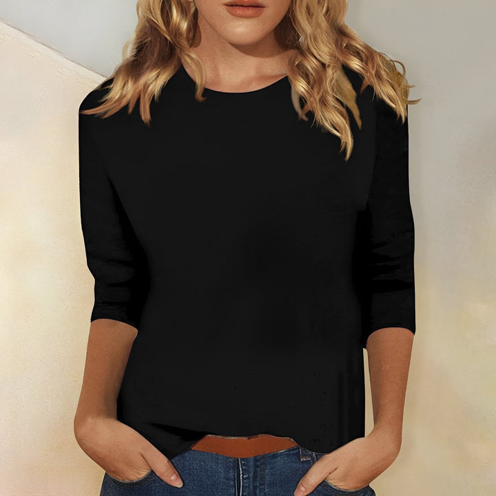 Blusinha feminina casual e prática com manga 3/4, perfeita para compor looks confortáveis.