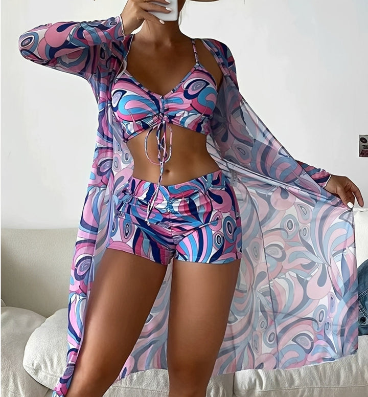 Maiô feminino de três peças versátil para o verão. Conjunto praia completo, roupa de banho moderna, cores.