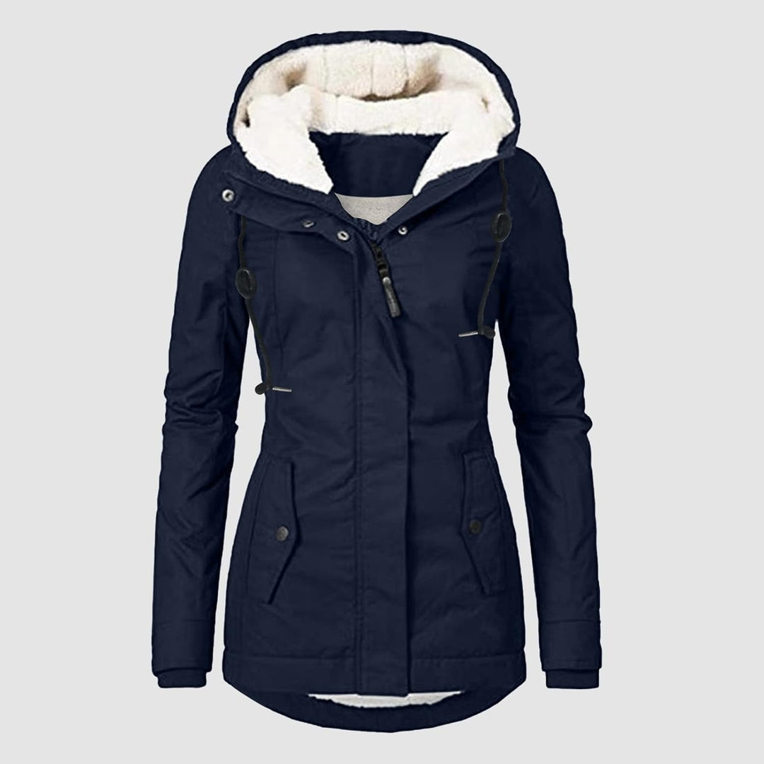 Casaco de inverno feminino acolchoado e impermeável, ideal para dias de frio e chuva intensa.