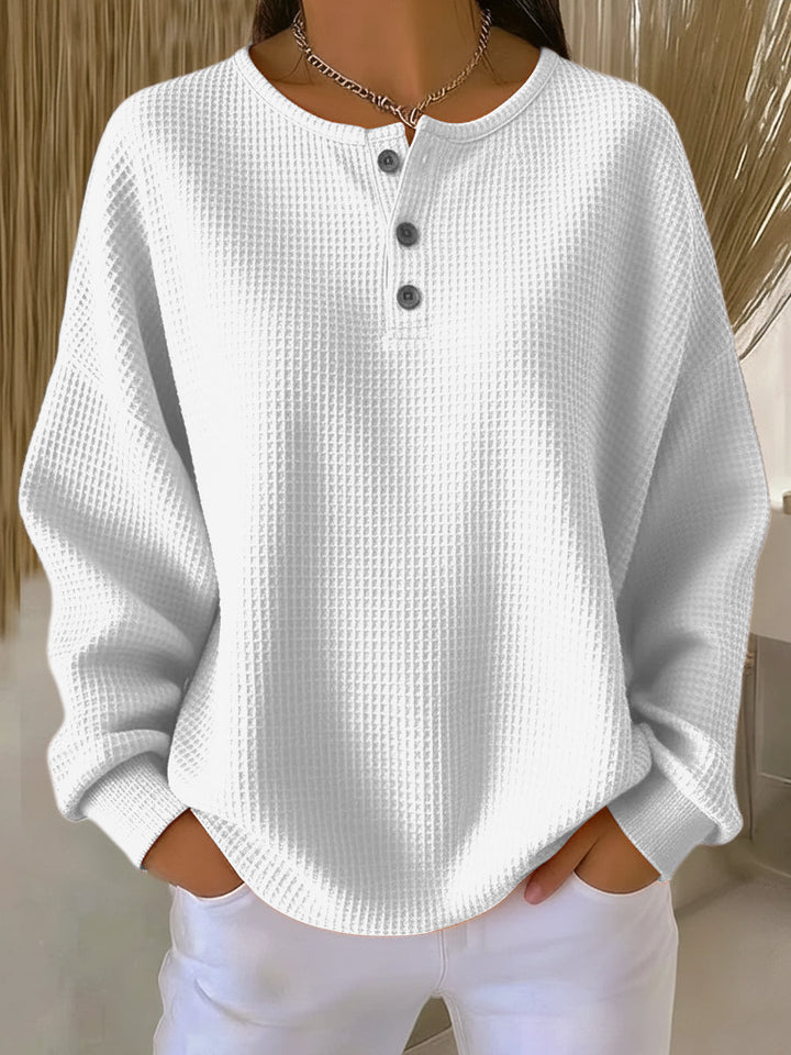 Camisola feminina casual elegante de gola. Peça essencial de moda outono/inverno em laranja vibrante, confortável e versátil.
