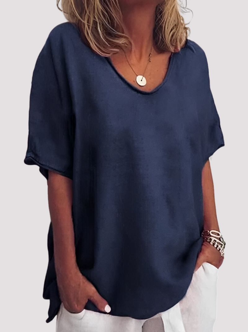 Blusa feminina casual. Peça solta e versátil, garantindo conforto e estilo para o dia a dia e verão.