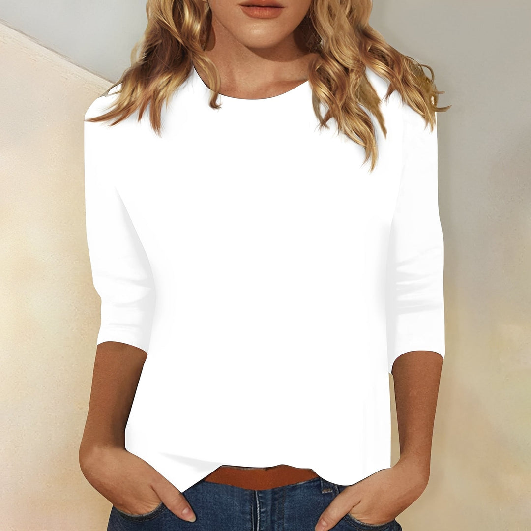 Blusa feminina confortável de caimento solto, manga 3/4, ideal para o verão e momentos de lazer.