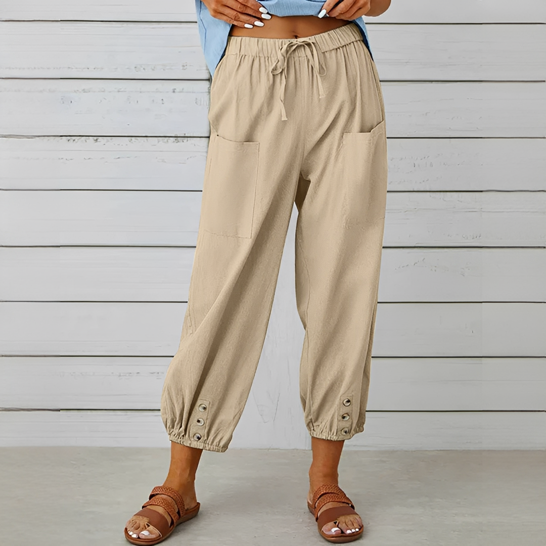 Calça feminina de verão perna larga, cintura alta. Roupa elegante e confortável para o verão.