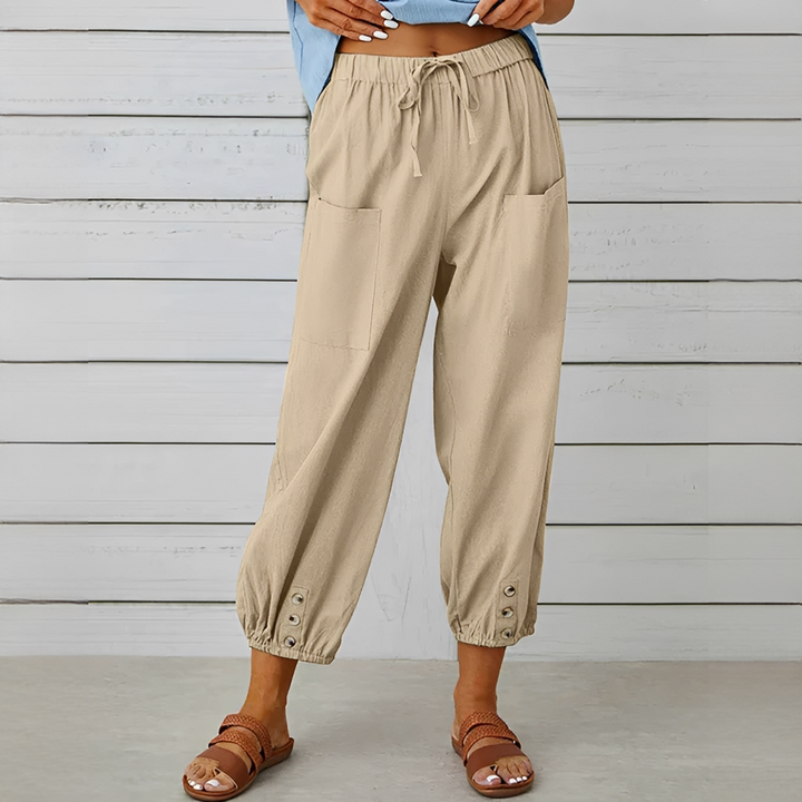 Calça feminina de verão perna larga, cintura alta. Roupa elegante e confortável para o verão.