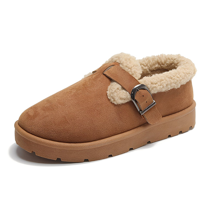 Calçado feminino de inverno quente, com conforto superior e sola antiderrapante para segurança no gelo.