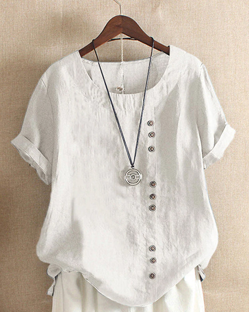 Blusa feminina elegante de manga curta, gola redonda. Roupa versátil para o dia a dia, em várias cores.
