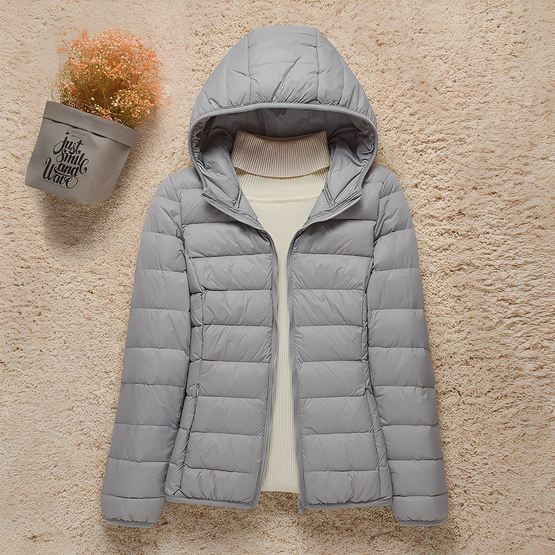 Jaqueta Feminina Milani acolchoada leve para outono/inverno, ideal para estilo casual e conforto.