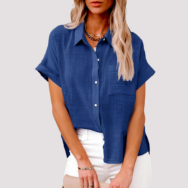 Blusa feminina casual folgada de manga curta e bolso, perfeita para o conforto no dia a dia.