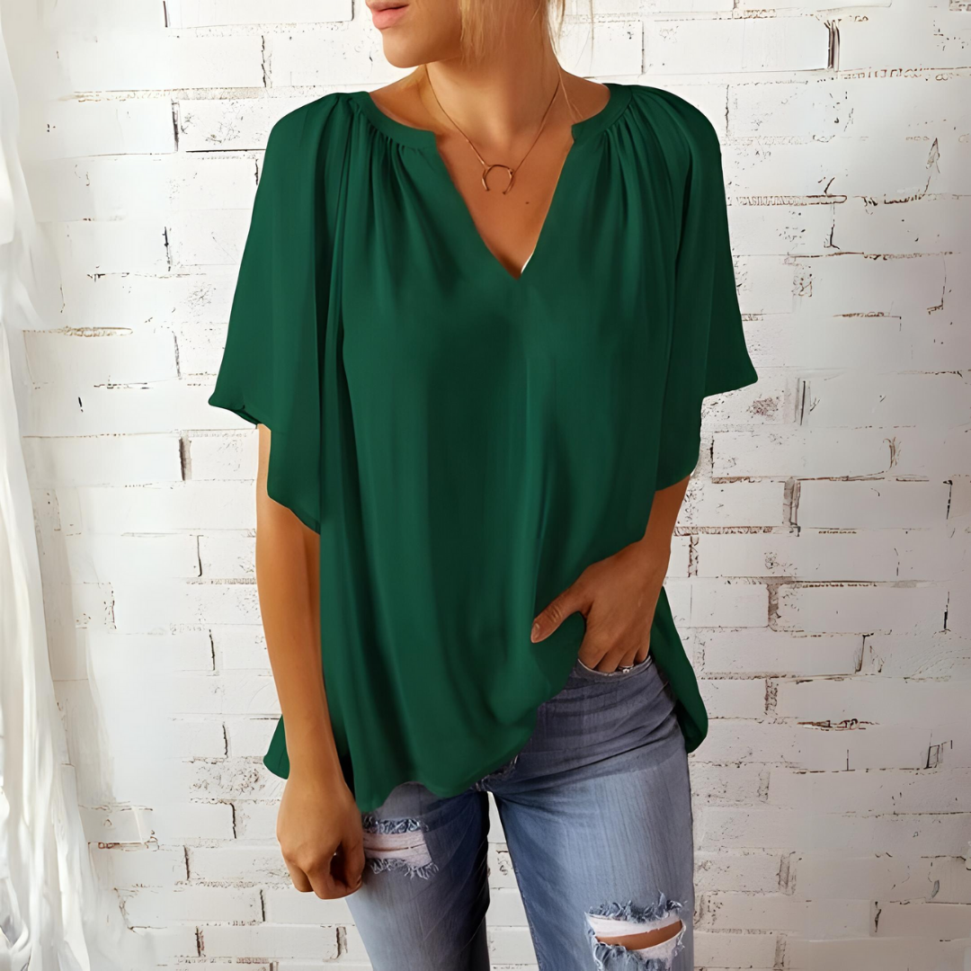 Blusa feminina casual chic, decote V, mangas esvoaçantes, perfeita para moda verão e primavera.