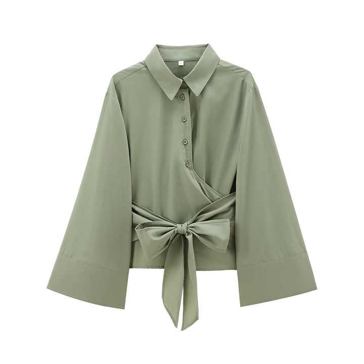 Blusa de verão feminina com cinto em cor vibrante, vestuário elegante para dias quentes.