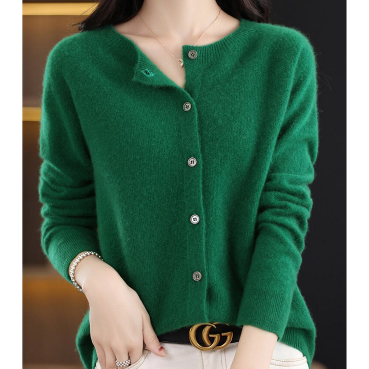 Suéter feminino elegante. Blusa de malha gola redonda, perfeita para moda inverno e conforto casual.