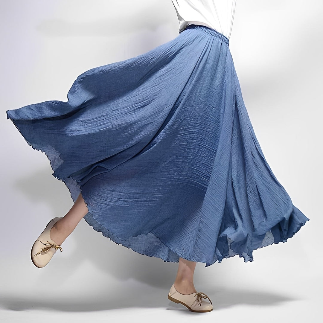 Estilosa saia maxi boêmia fluida feminina. Roupa elegante e confortável para o verão, ideal para praia.