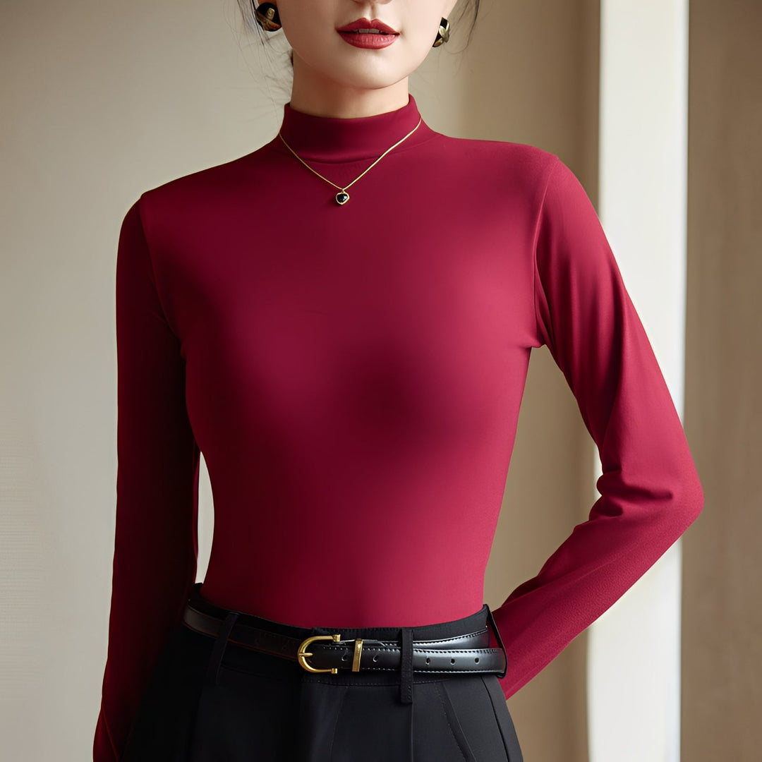 Top feminino com gola alta e estilo elegante, perfeito para conforto diário e versátil em moda casual.