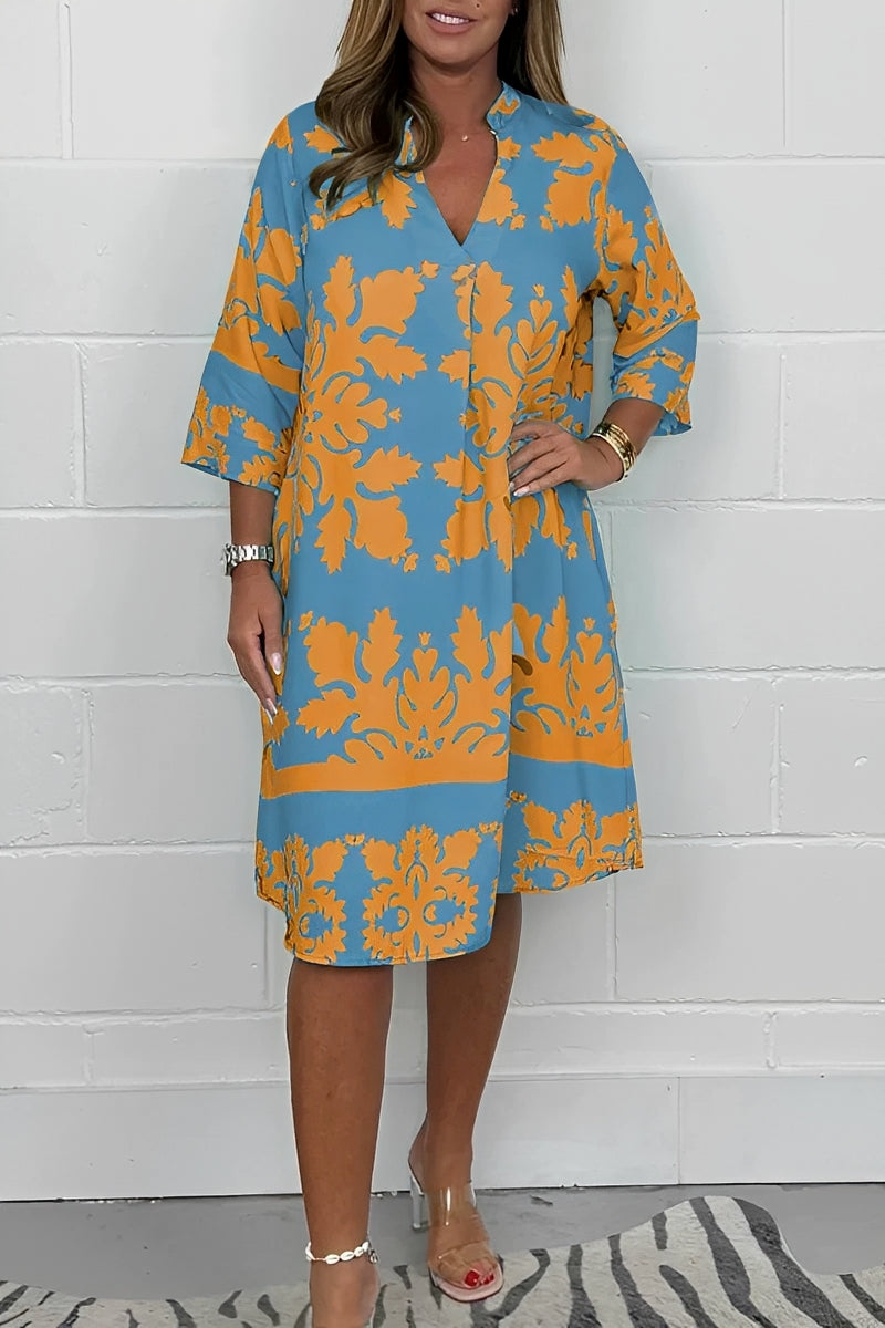 Vestido feminino midi folgado, elegante e confortável. Roupa de mulher ideal para primavera e verão.