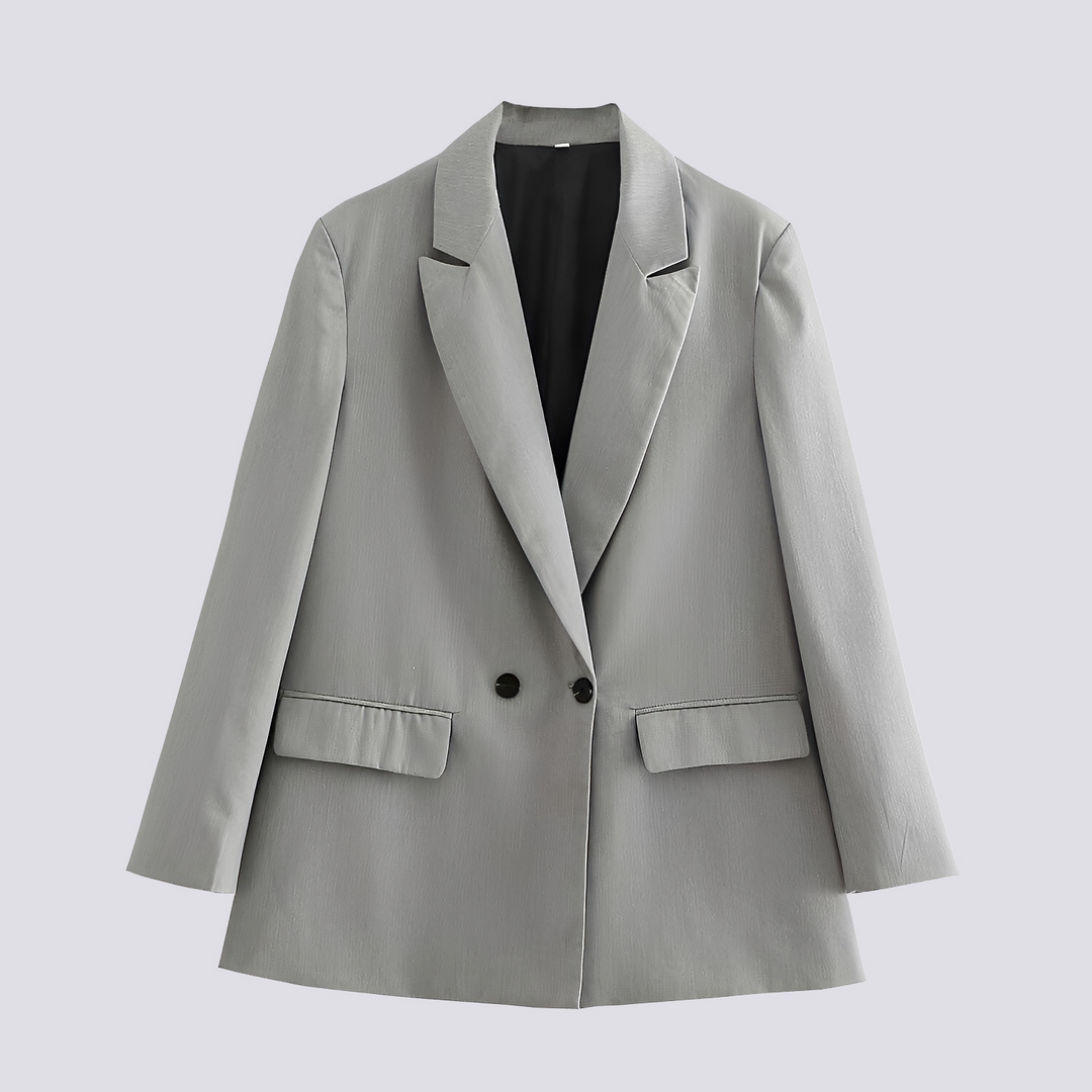 Blazer feminino elegante oversized. Peça de alfaiataria versátil para escritório ou eventos, adiciona estilo e sofisticação.