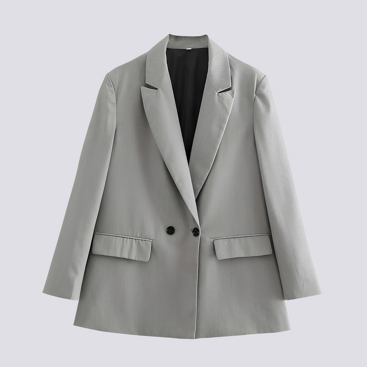 Blazer feminino elegante oversized. Peça de alfaiataria versátil para escritório ou eventos, adiciona estilo e sofisticação.