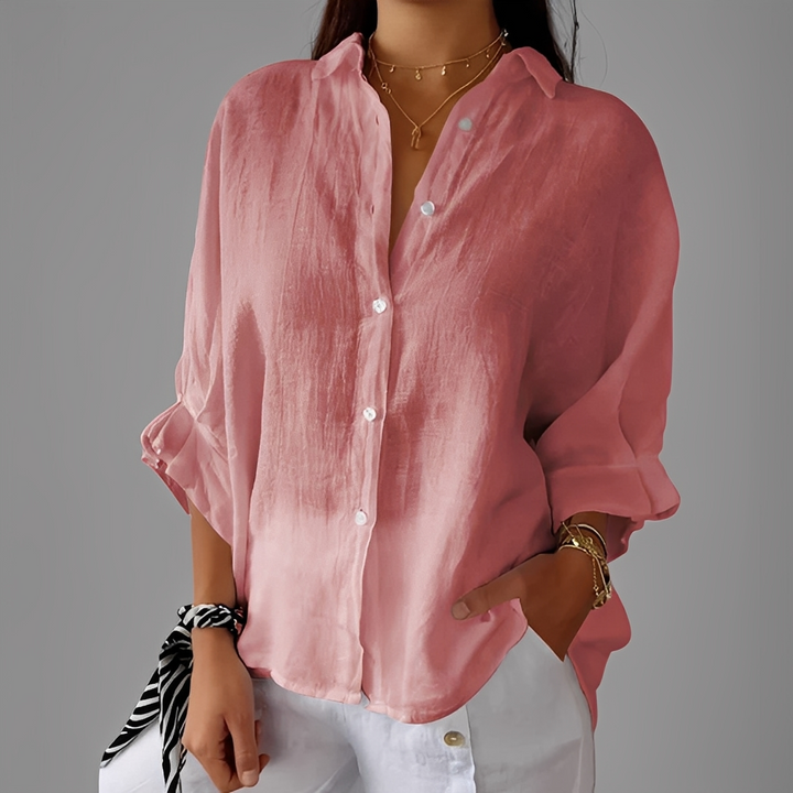 Blusa abotoada feminina manga longa. Estilo clássico e elegante, ideal para outono, inverno e primavera.