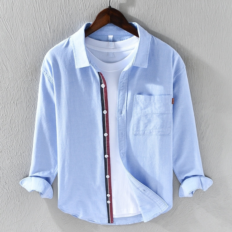 Roupa masculina: Camisa casual azul de manga longa, confortável e moderna para o dia a dia.