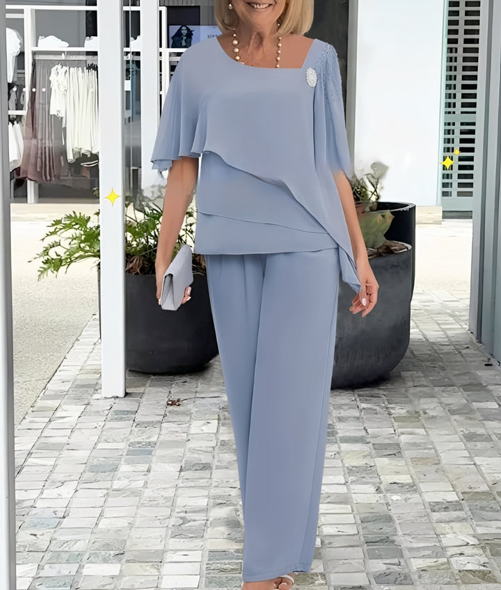 Conjunto feminino elegante Leah azul de duas peças. Ideal para moda verão, oferece estilo casual e conforto.
