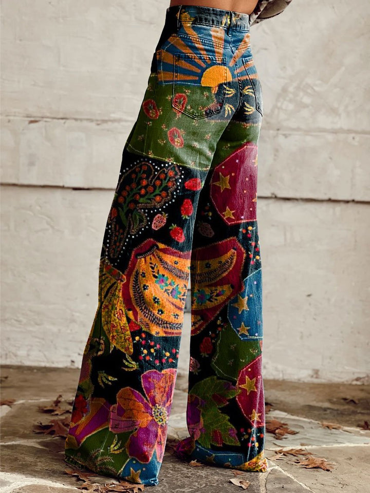 Calças femininas boho vintage com estampa vibrante. Modelo largo de cintura alta, ideal para moda casual e verão.