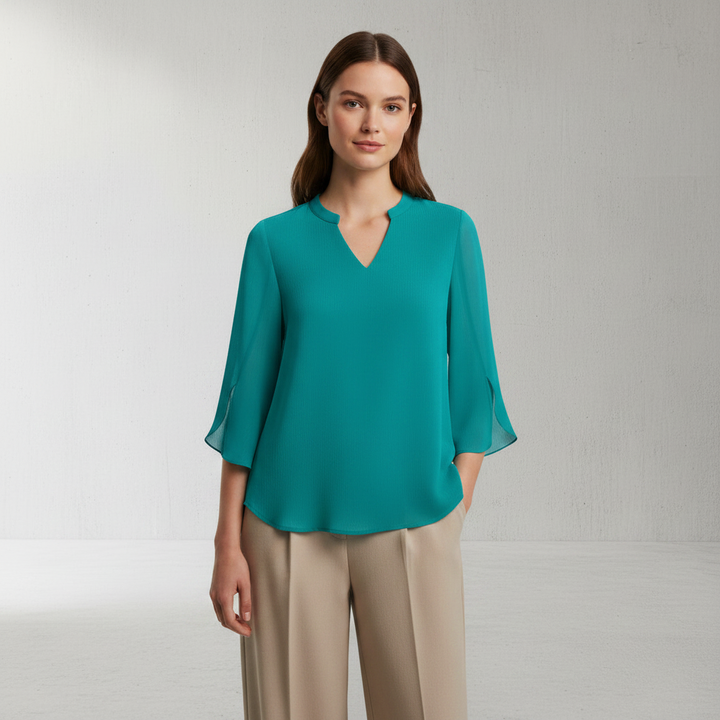 Blusa feminina de verão Brianna, fluida e com mangas abertas, para conforto e estilo casual.