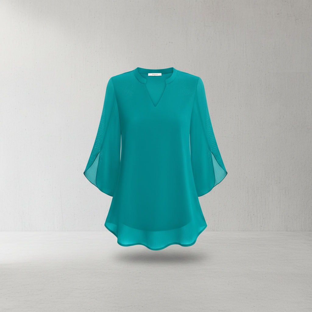 Blusa feminina Brianna com mangas abertas, design moderno e tecido fluido para moda elegante.