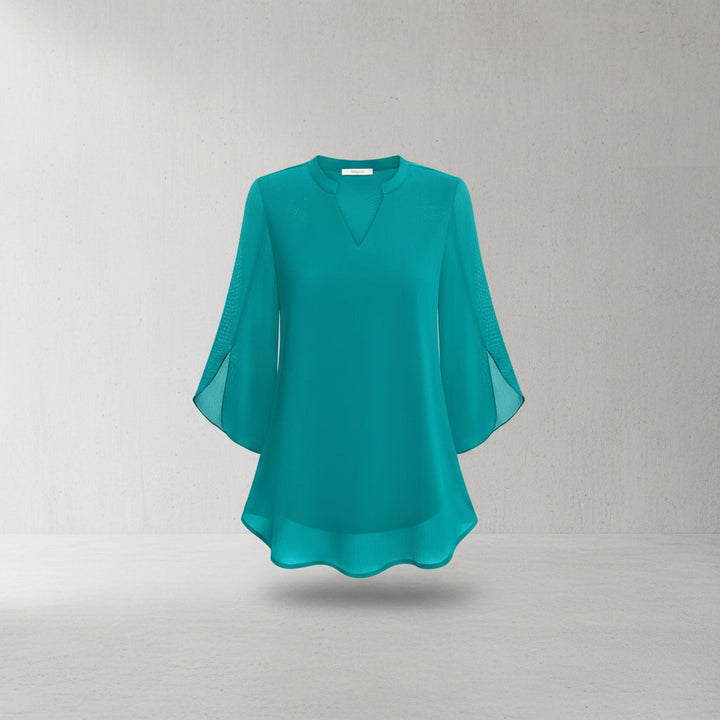 Blusa feminina Brianna com mangas abertas, design moderno e tecido fluido para moda elegante.