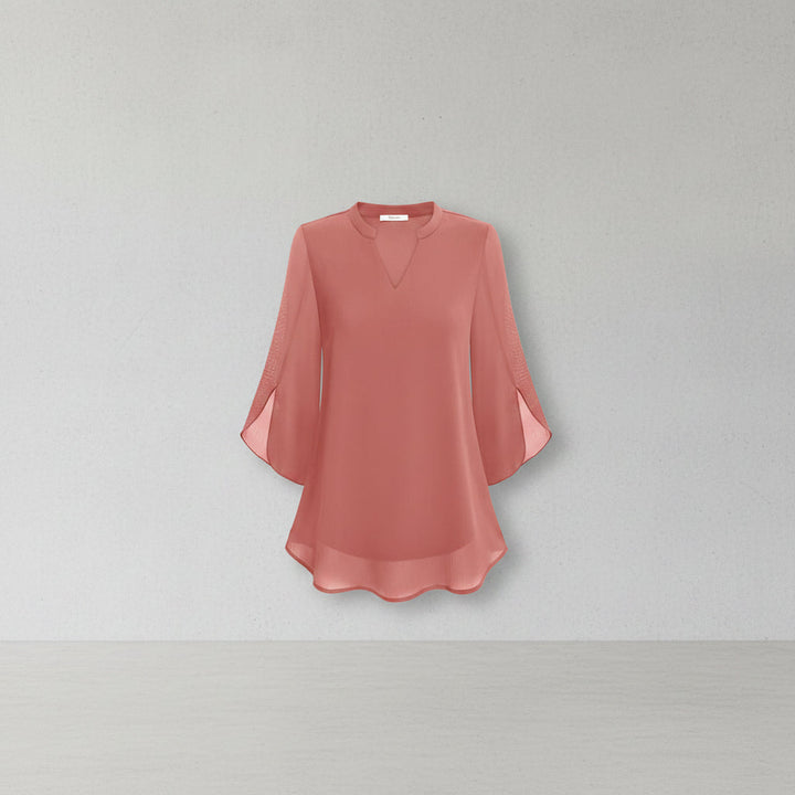 Blusa feminina estilo chique Brianna, fluida e com mangas abertas, para moda elegante e conforto.