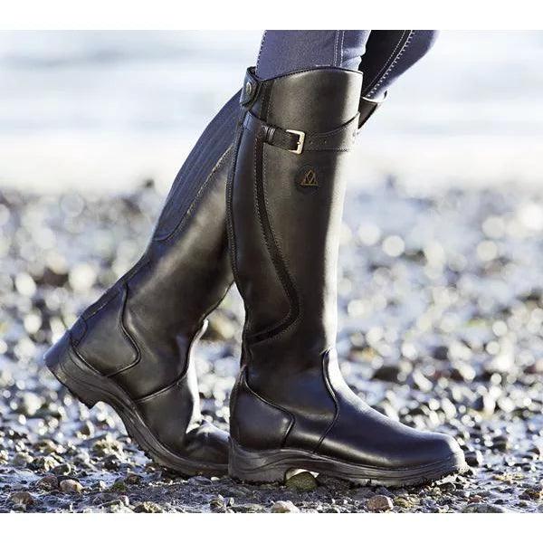 Botas de equitação femininas à prova d'água, proporcionando proteção e estilo para montaria e uso diário.