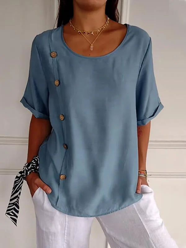 Blusa feminina elegante com botões, perfeita para looks casuais e chic. Camisa confortável e moderna.