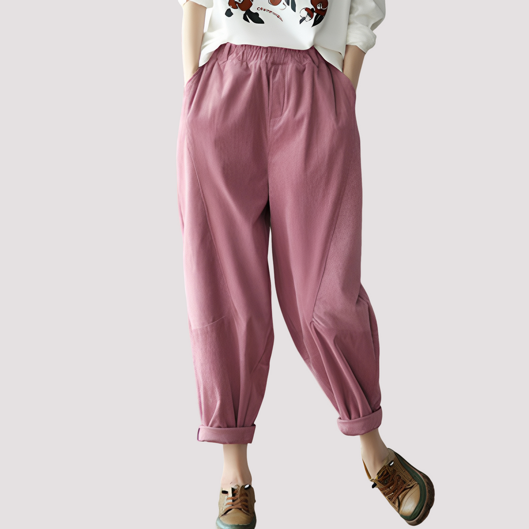 Calça harém feminina casual com cós elástico para conforto máximo no verão, ideal para um look descontraído.