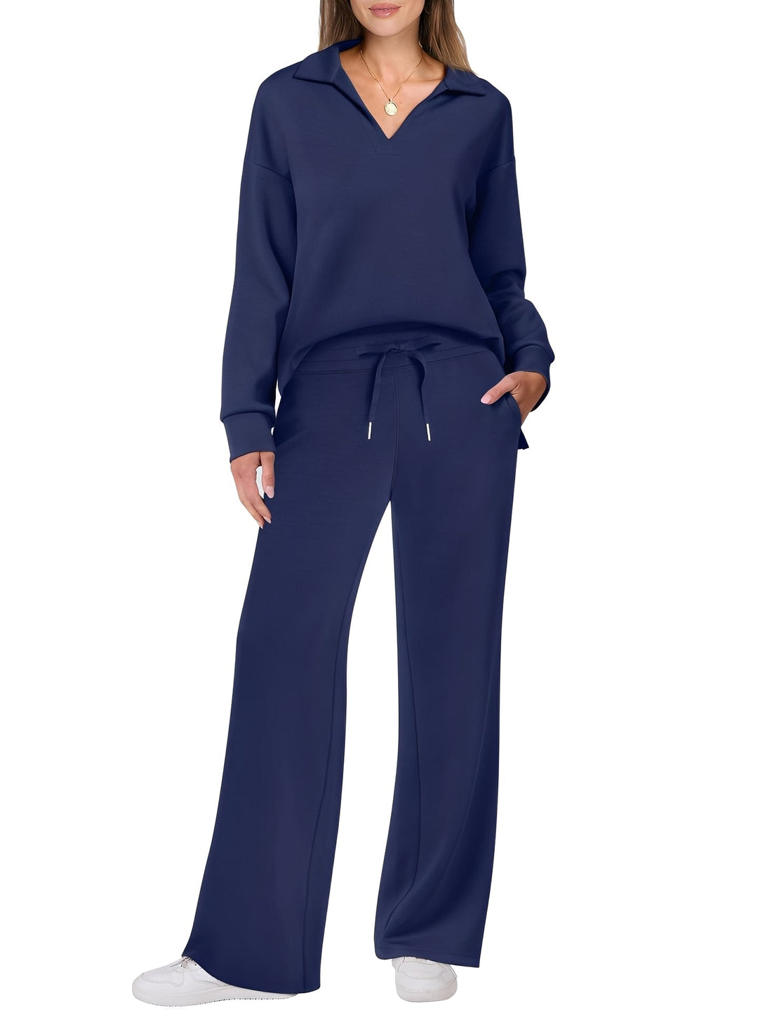 Conjunto de home office feminino: suéter estiloso e calças confortáveis, perfeito para um dia produtivo e relaxado.