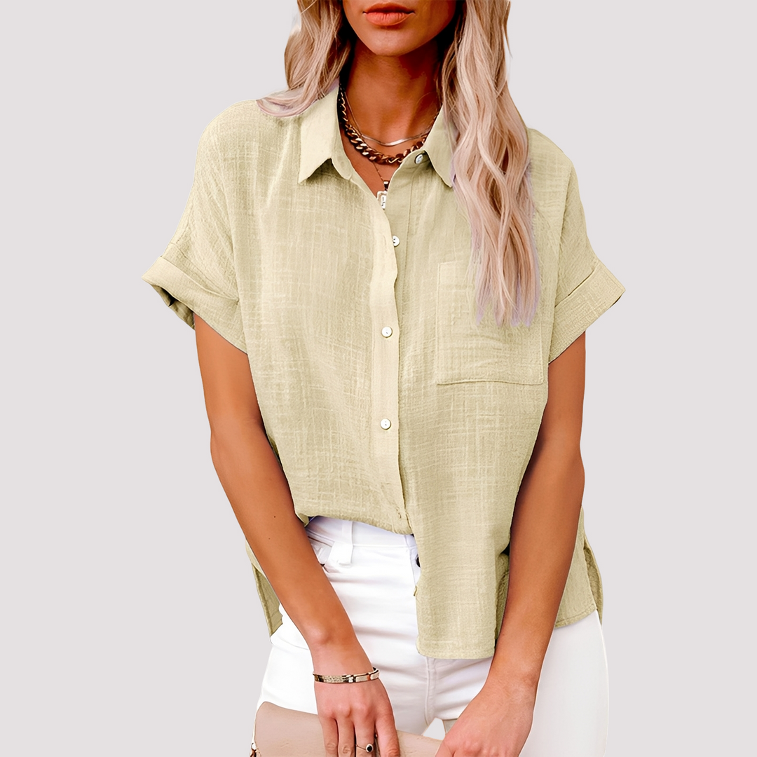 Blusa feminina casual folgada de manga curta com bolso, ideal para o verão e dia a dia.