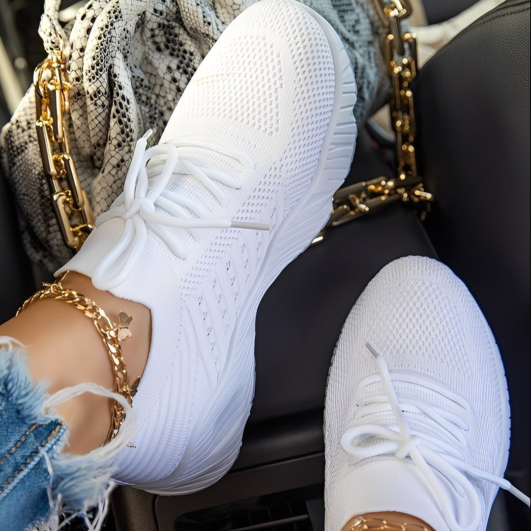 Tênis Axelle feminino respirável e ultraleve, perfeito para longas caminhadas e uso casual.